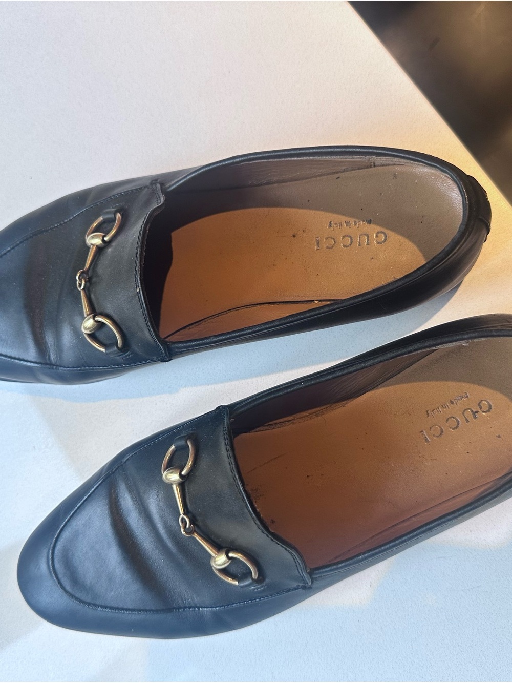 Gucci Black Leather Slip-On Dress Loafers with Gold Accents